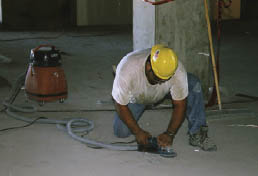 Photo of handheld grinder use