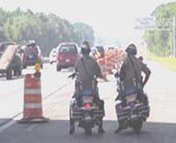  Photo of troopers waiting on road