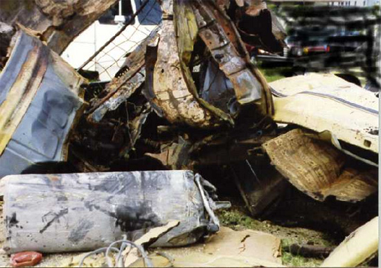 Photo of Pickup and cylinder remains