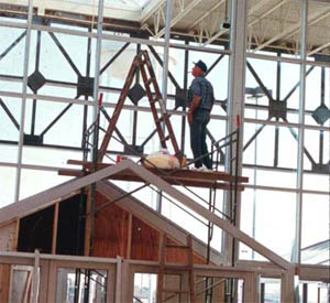 Photo of ladder use on scaffolding