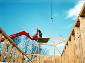 Photo of heavy equipment used as scaffolding