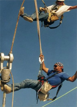 Photo of gin pole and harness use