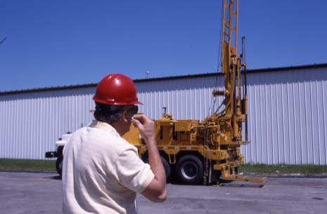 Photo of man insert ear plugs