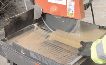 photo of a power saw with dust suppression in use