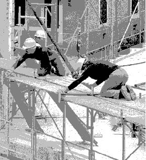Figure 93.4 Assembling scaffolding at a Geneva, Switzerland, construction site without adequate protection 
