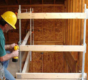 Figures 21 & 22 - Examples of guardrails installed around floor openings.