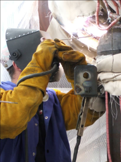 Construction Worker Performing Welding Work