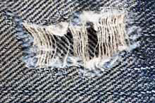 threadbare textile from abrasion