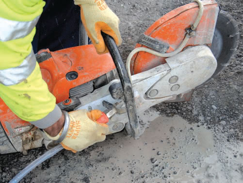 photo highlighting the water suppression system on a saw