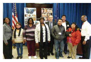 Lashunda Bobbitt, Salvadora Roman, Donaly Brown, Marvie Chapman, Bacilio Castro, Miguel Nix, Ana Nix, and Sherri Jones meet with OSHA chief Dr. David Michaels to discuss hazards facing poultry workers.