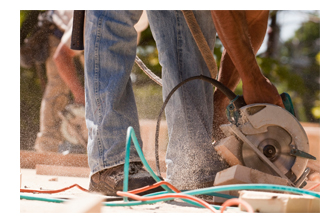 photo of worker and circular saw