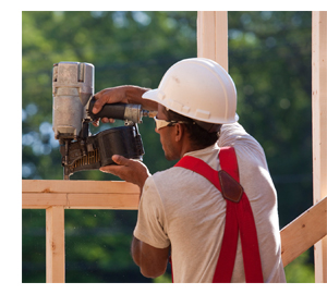 photo of workers nailgunning