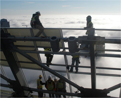 Photo: 2nd place in OSHA’s 2011 photo contest, construction workers working in the clouds. Courtesy Roberto Carlos Vergara of Charlotte, North Carolina.