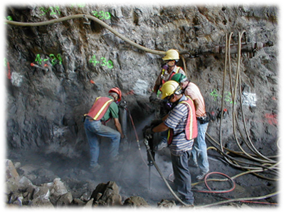 Workmen using jackhammer and enduring dust. Photo courtesy eLCOSH and Mt. Sinai School of Medicine.