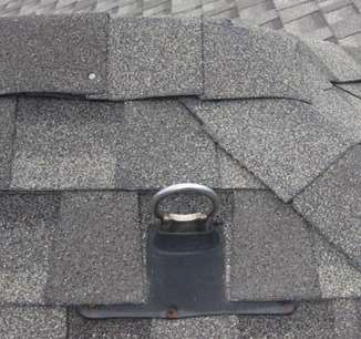 Photo of a roof with an anchor.