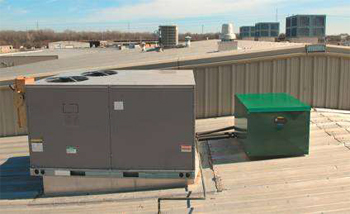 Photograph of a roof with equipment away from roof edge