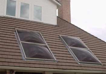 skylight on the lower level, steep roof top