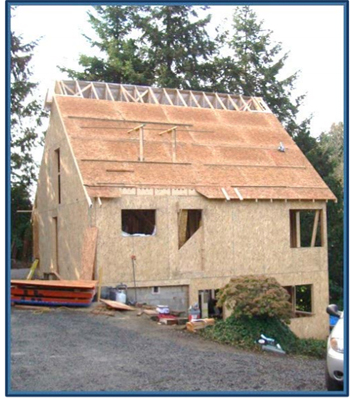 Incident scene showing the two-story residential
12/12 pitch roof from which the victim fell 18 feet
while installing sheathing without using fall protection.