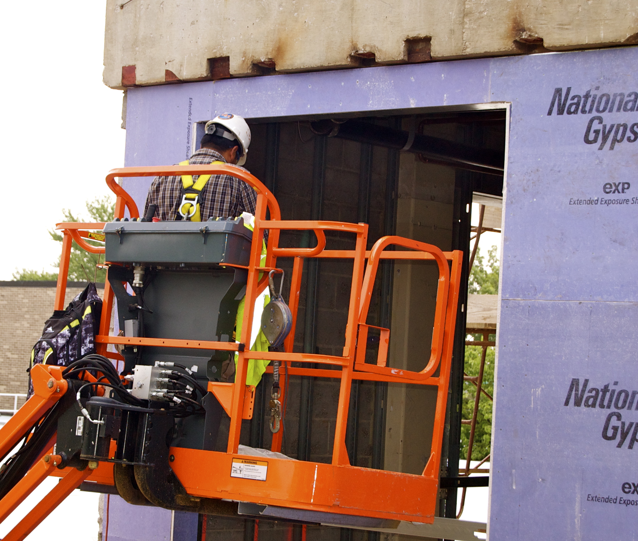 Aerial Lift Fall Harness use